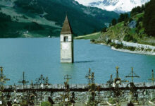 Photo of La triste storia del Campanile Solitario di Curon. Un viaggio tra leggenda ed emozione